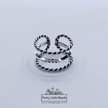 Load and play video in Gallery viewer, 925 Sterling Silver Rotating video of Triple Ring #2, 9mm | Pretty Little Bands
