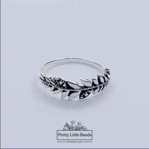 Rotating video of 925 Sterling Silver Olive Branch Ring, 7mm | Pretty Little Bands